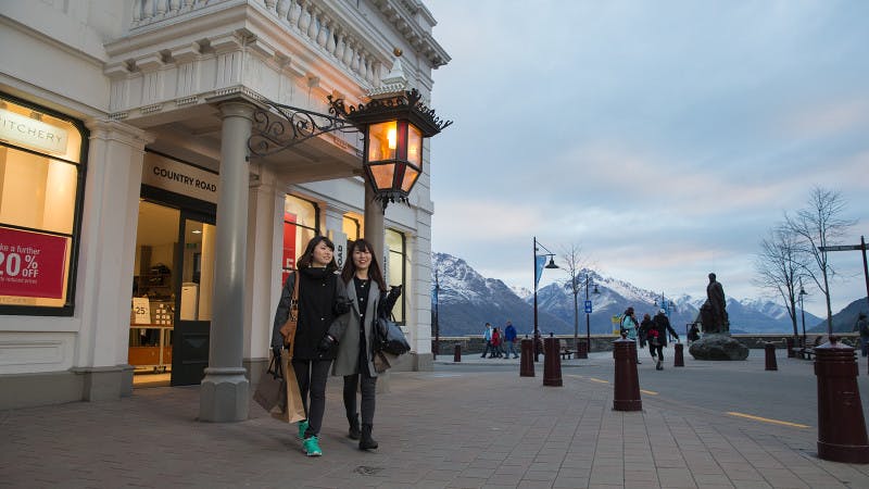 Students walking through the streets of Queenstown, New Zealand