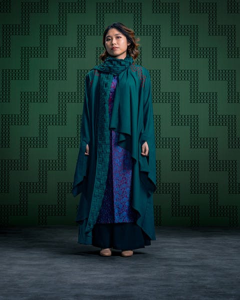 Ginny in her symbolic graduation kākahu (garment)