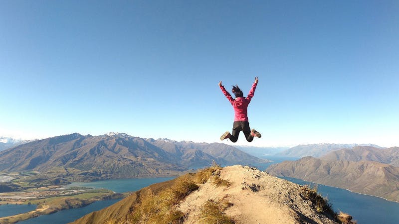 student jumping in the outdoors in New Zealand