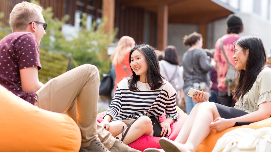 Students relaxing on beanbags on a New Zealand university campus
